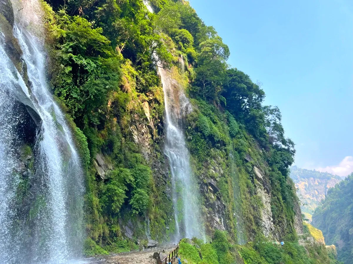 Waterfall falling on the trail