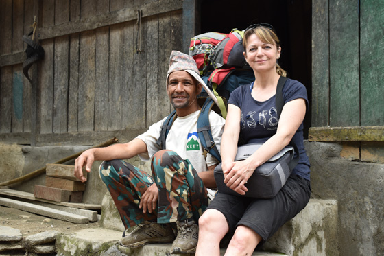 Tourist clicking picture with porters